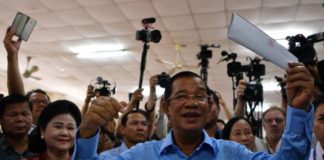 Cambodia ruling party claims ‘huge victory’ in vote decried as ‘sham’