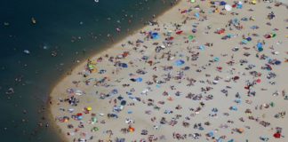 All-time records almost fall on day of scorching sun across Europe