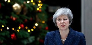 Theresa May defeats Tory coup over Brexit deal but is left damaged