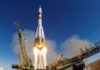 Soyuz arrives at ISS on first manned mission since October failure