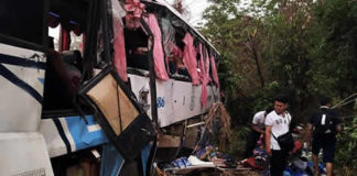 Thai emergency rescuers cry as they meet 3 year old boy in Nakhon Ratchasima bus accident site
