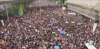 Nearly 2 million people march to oppose Hong Kong extradition bill, organisers say