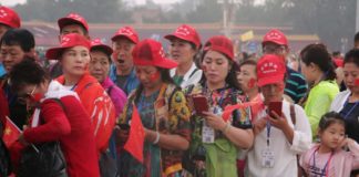 Beijing falls silent as tight security surrounds Tiananmen Square anniversary