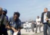 Haiti: photojournalist shot in face as senator opens fire outside parliament