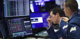 Stocks hurt by trade war, pound hit by no-deal Brexit fears