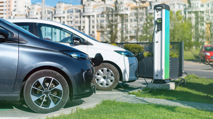 two-charging-electric-cars