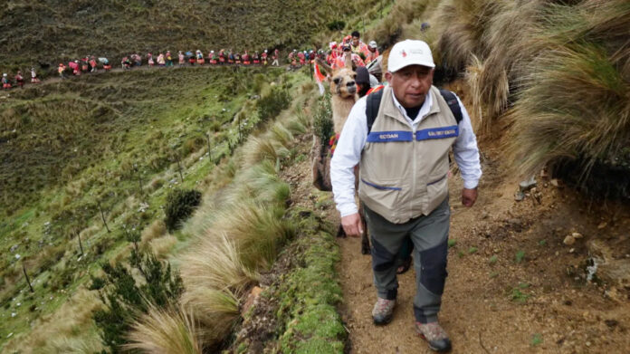 constantino-aucca-walks-up-mountain